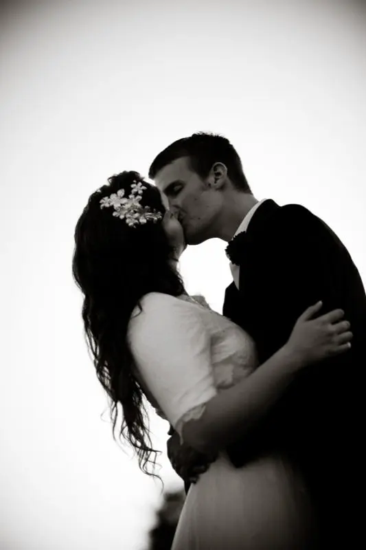 Bride and Groom kissing Black and white of photos of married couple kissing