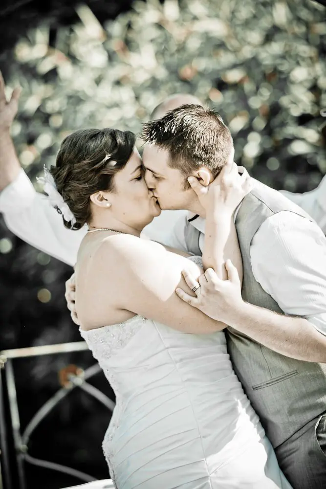 1st kiss during ceremony a young couple's first kiss at their wedding