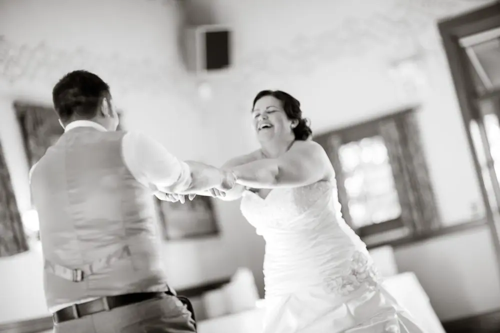 1st dance bride laughing during first dance