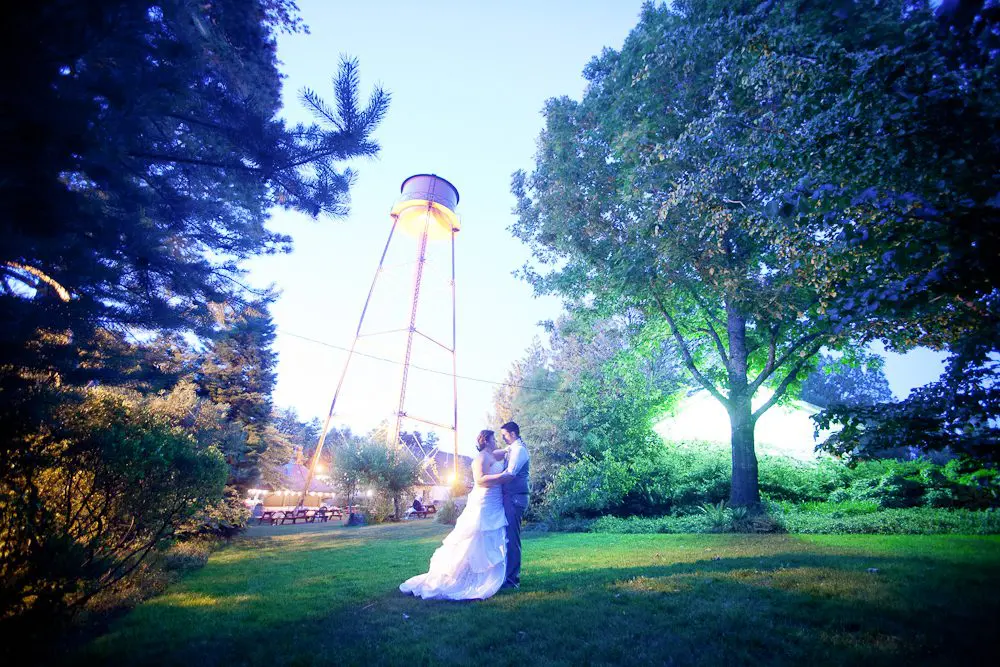 dramatic night shot of couple at the wedding night landscape shot of newly married couple