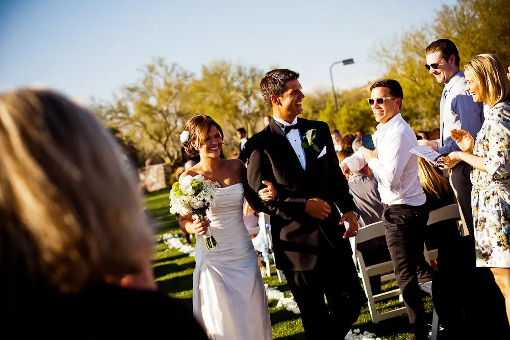 just after the ceremony bride and groom smiling after being married