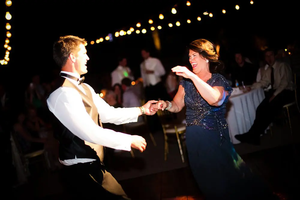groom and his mom dancing the groom and his mother having a great time dancing at the reception