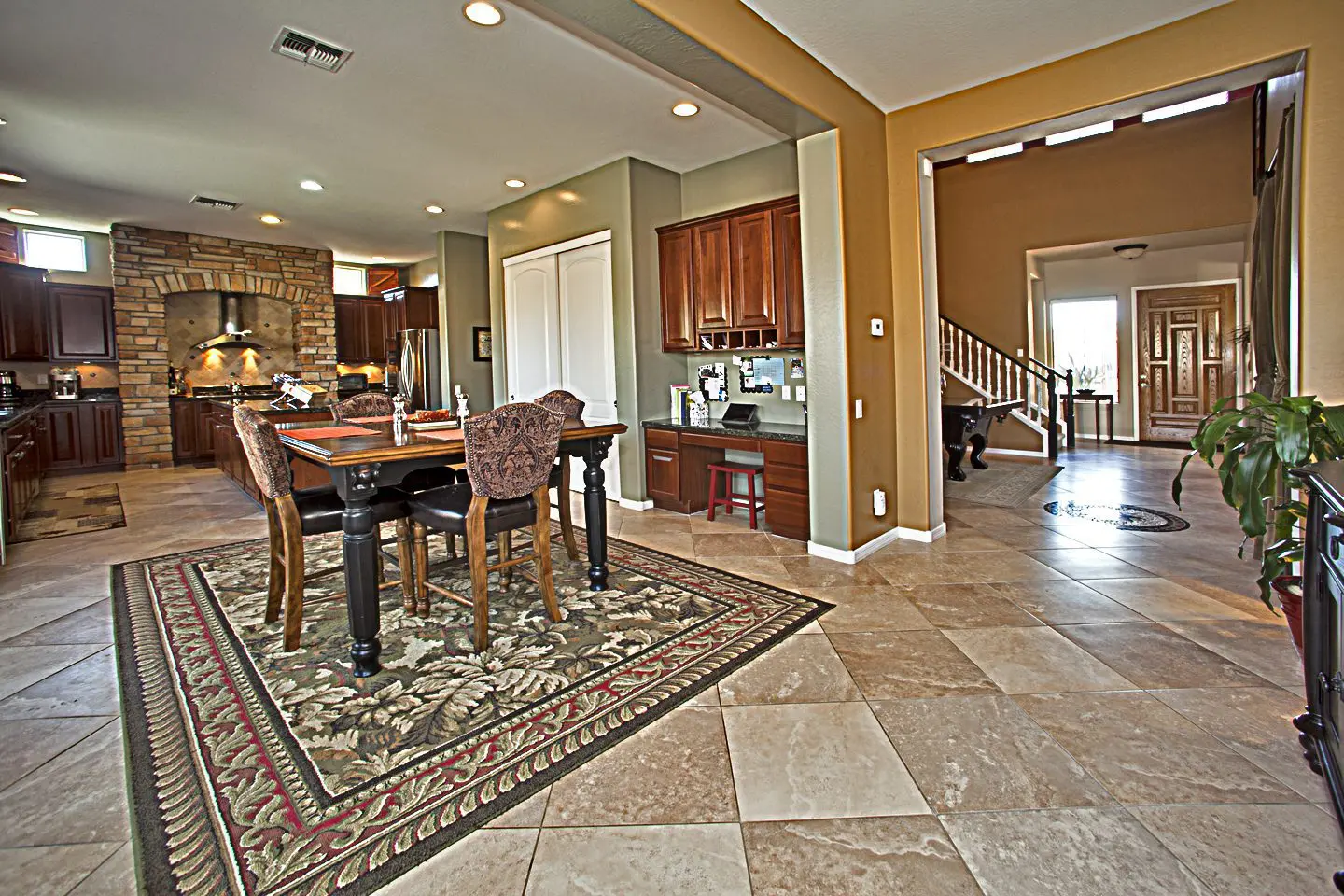 wide view of kitchen to entry hall