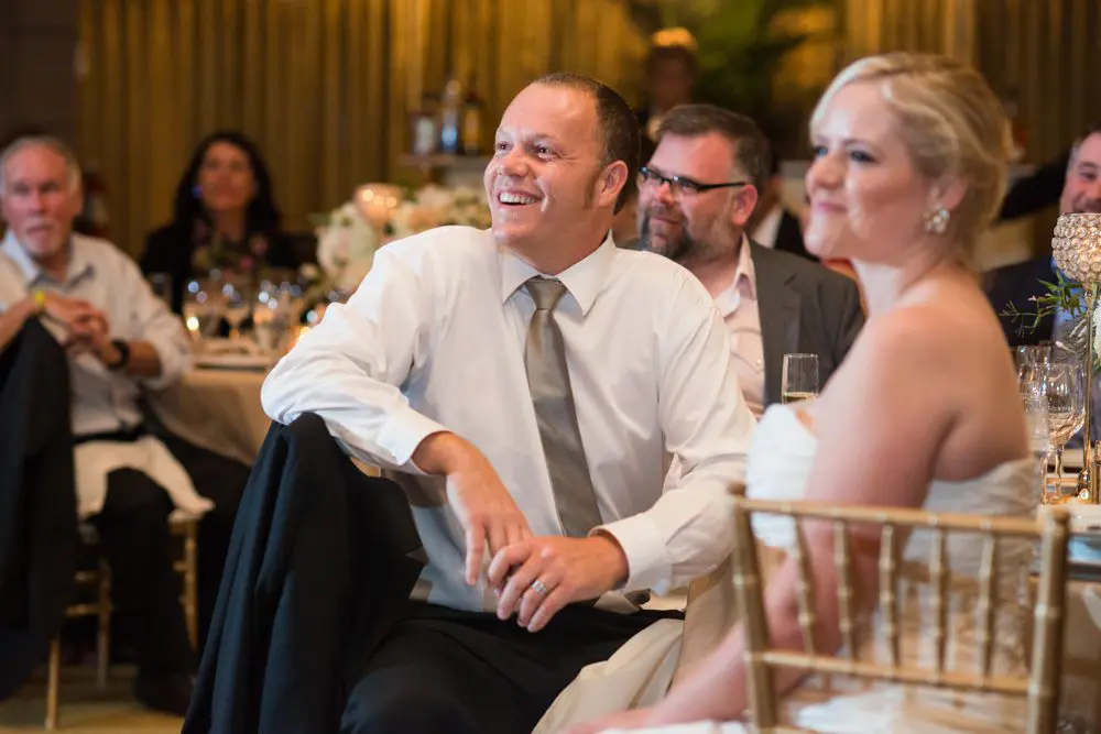 bride and groom during toasts az wedding photographer