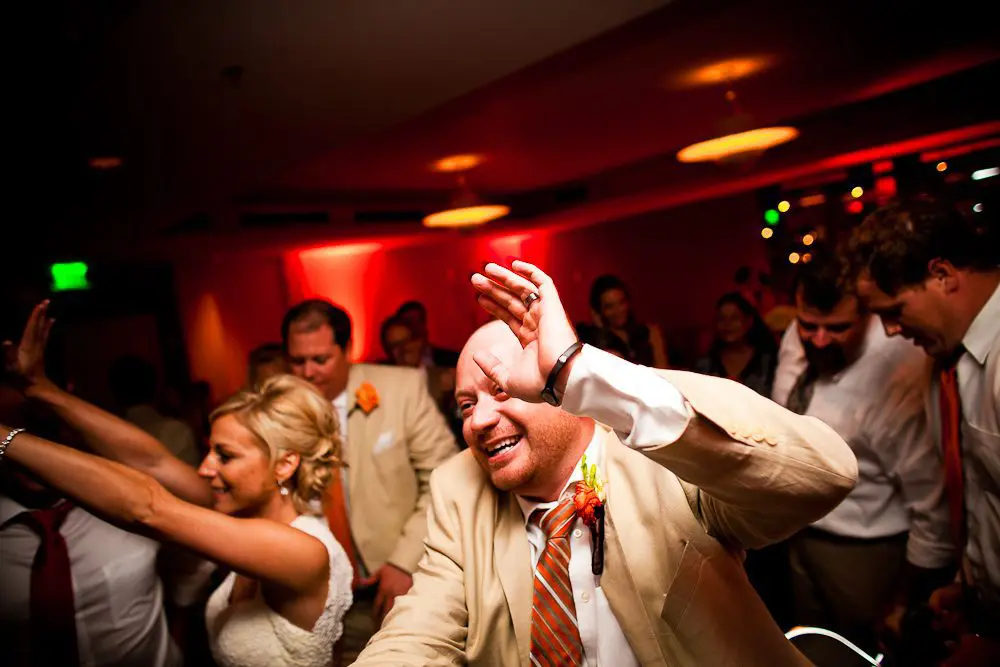 the groom highfiving