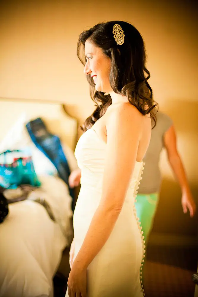 the bride emerges in her dress