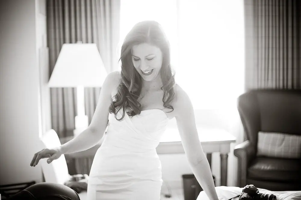 the bride getting her shoes on
