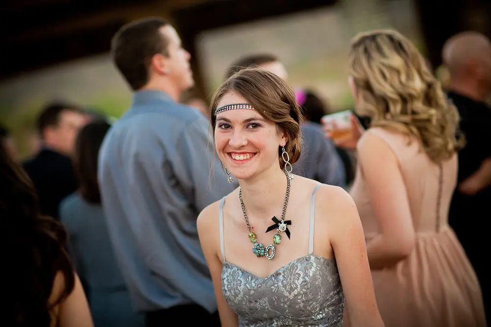 little sis smiles for the camera