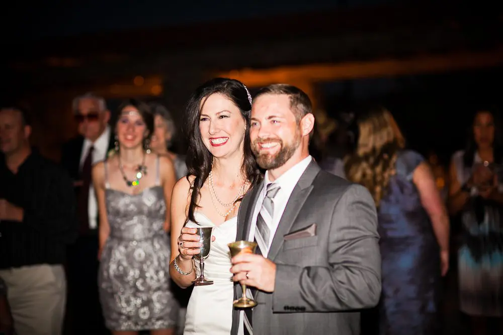 bride and groom laughing during the toasts