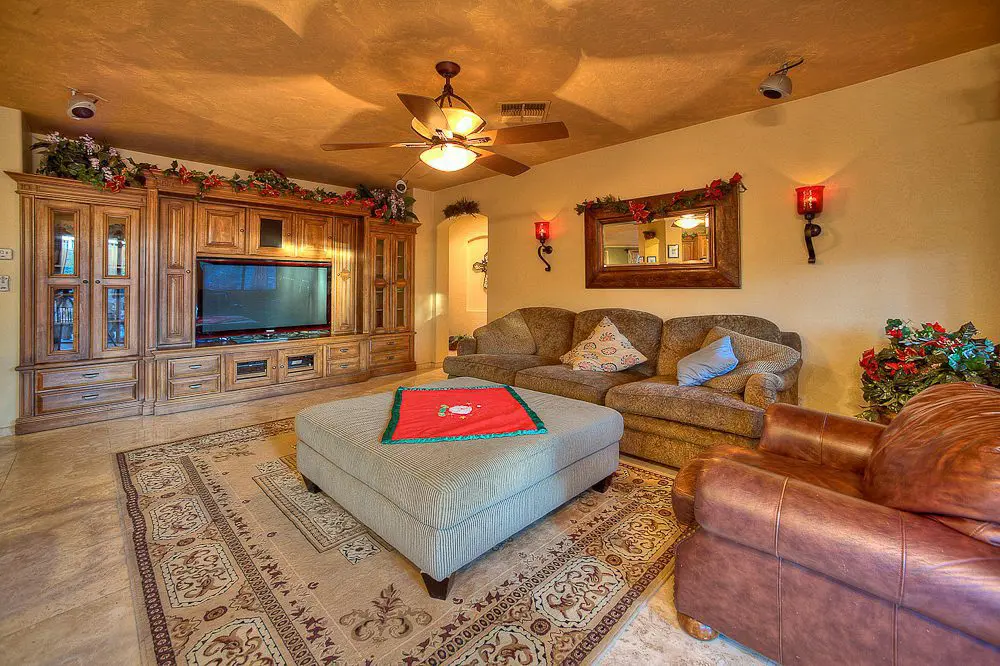 family room with custom cabinets around television