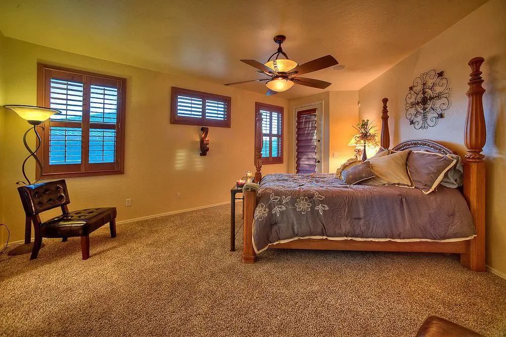 master bedroom with door to backyard