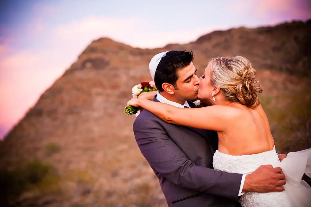 kissing with the squaw peak in the background