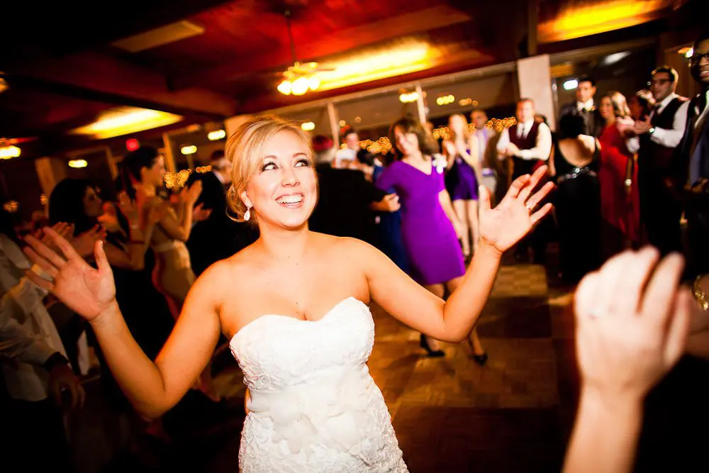 the bride making a funny face during the reception