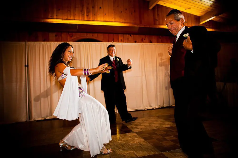 belly dancer dancing with the two fathers