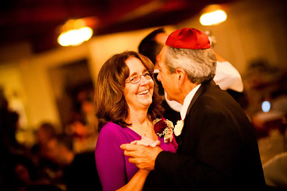 the mother in law laughing while dancing