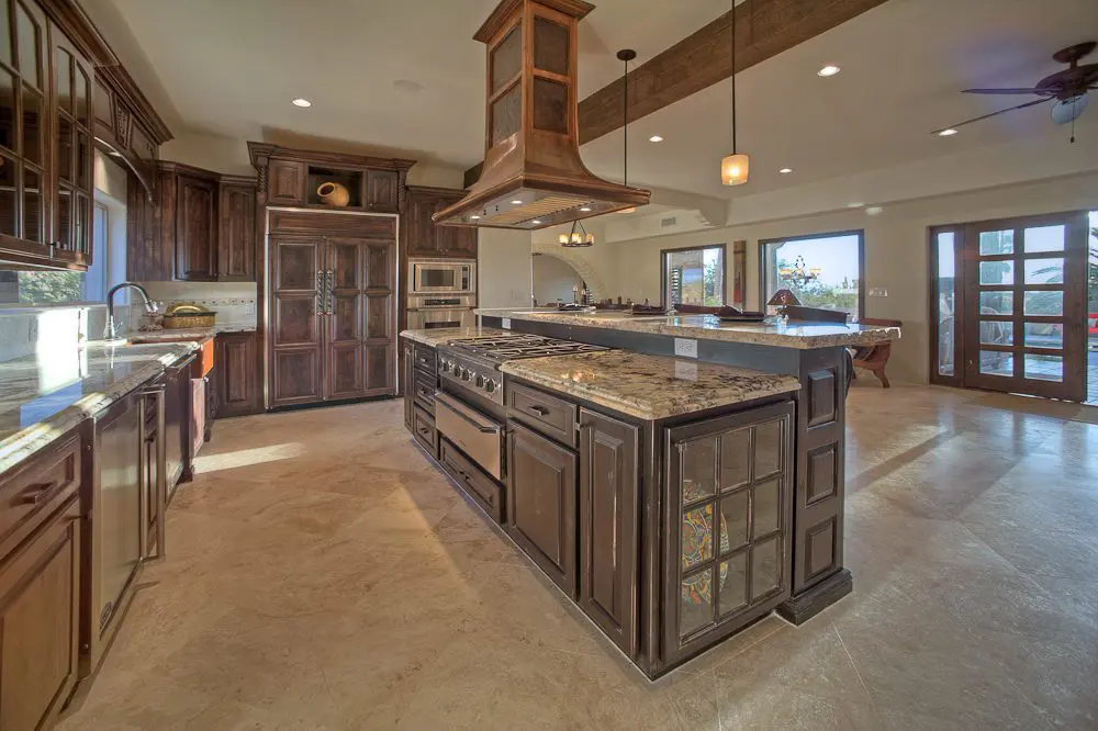 the kitchen with nice hood