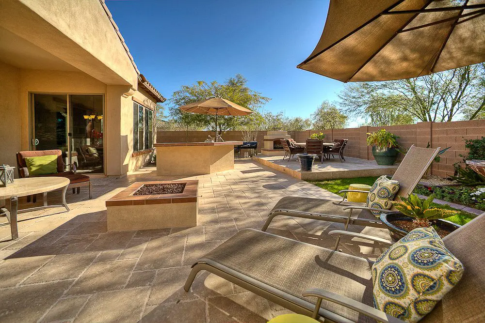 outdoor fireplace and kitchen