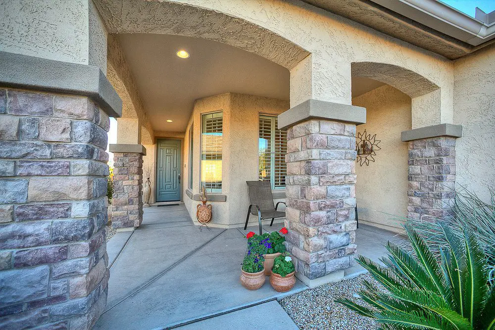 the front door and front yard sitting area