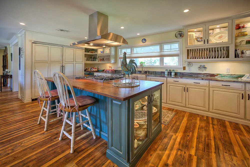 kitchen with overhead stainless steel fan