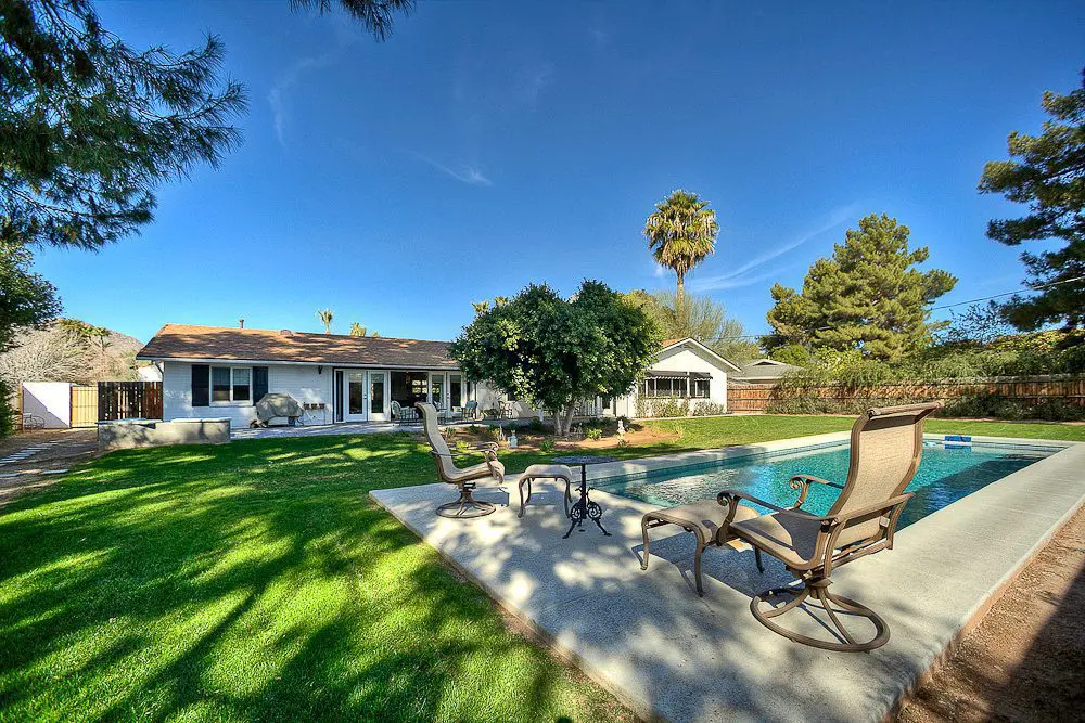pool in the backyard with view of camelback mountain