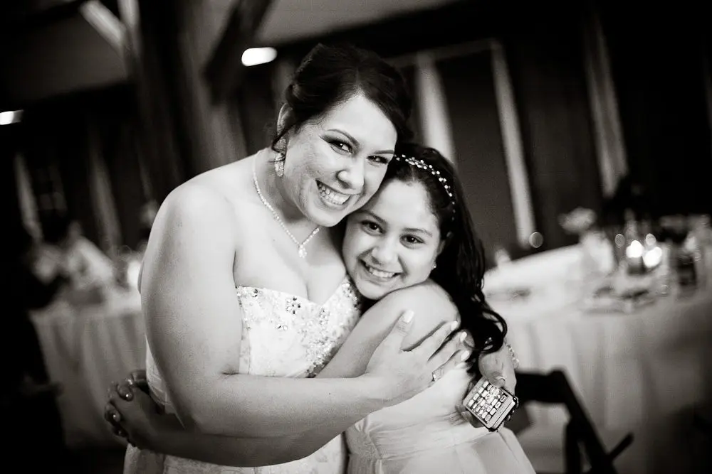 with the flower girl at the reception