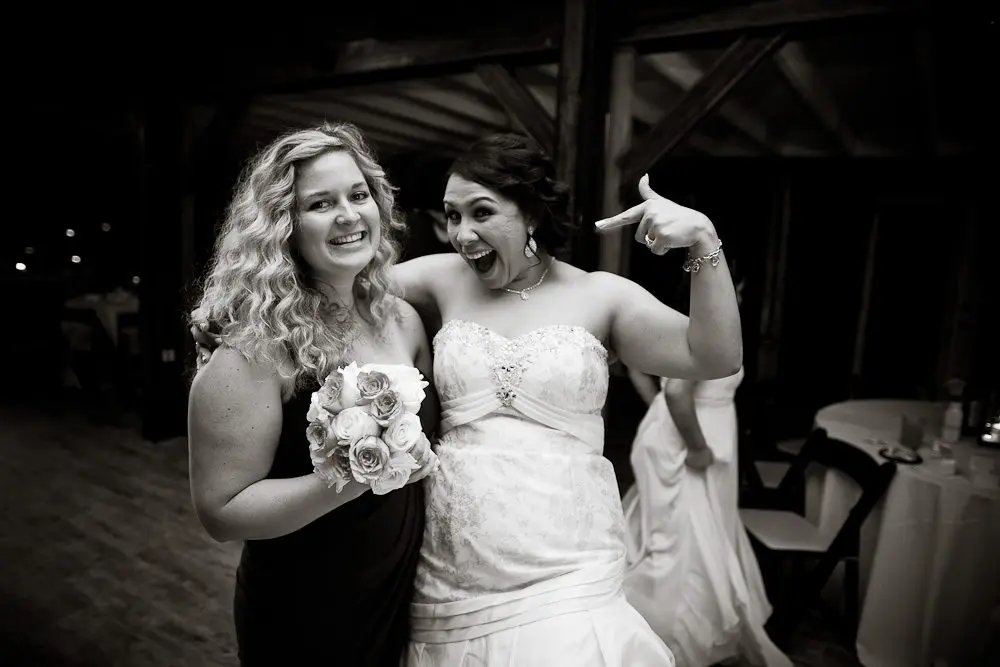 bride with single lady who caught the flowers