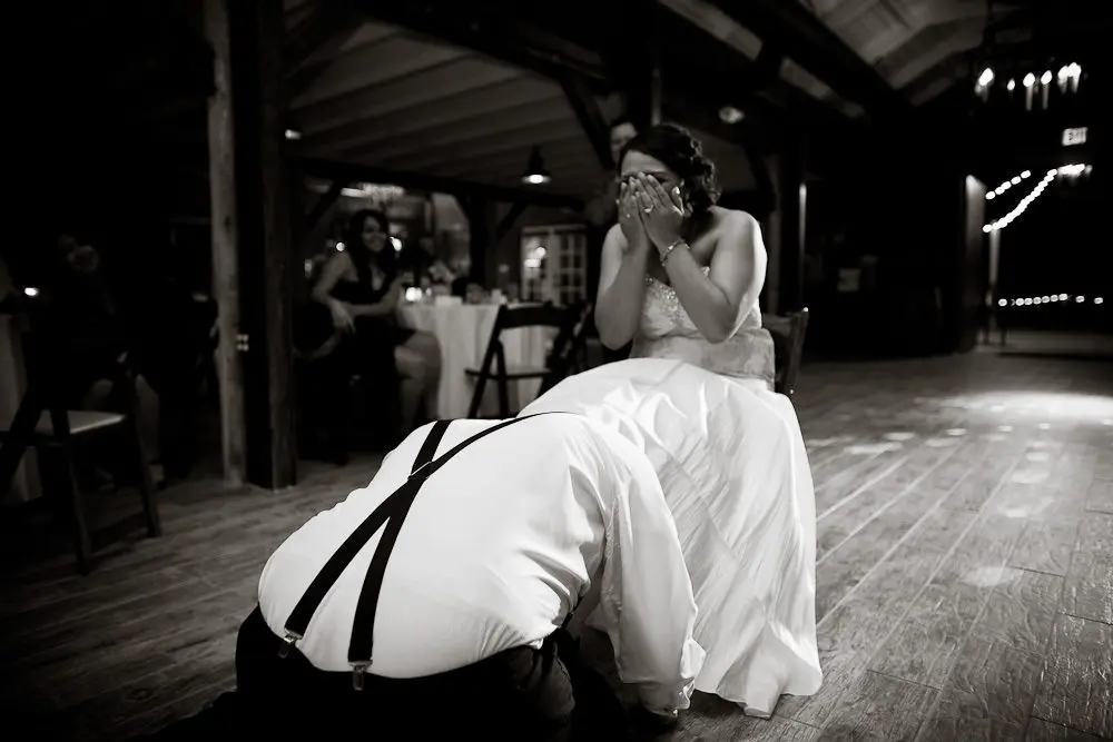 the bride embarressed during the garter retrieval