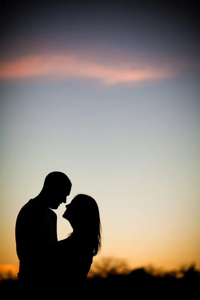 at sunset and about to kiss