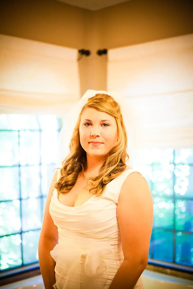 portrait of the bride while getting ready