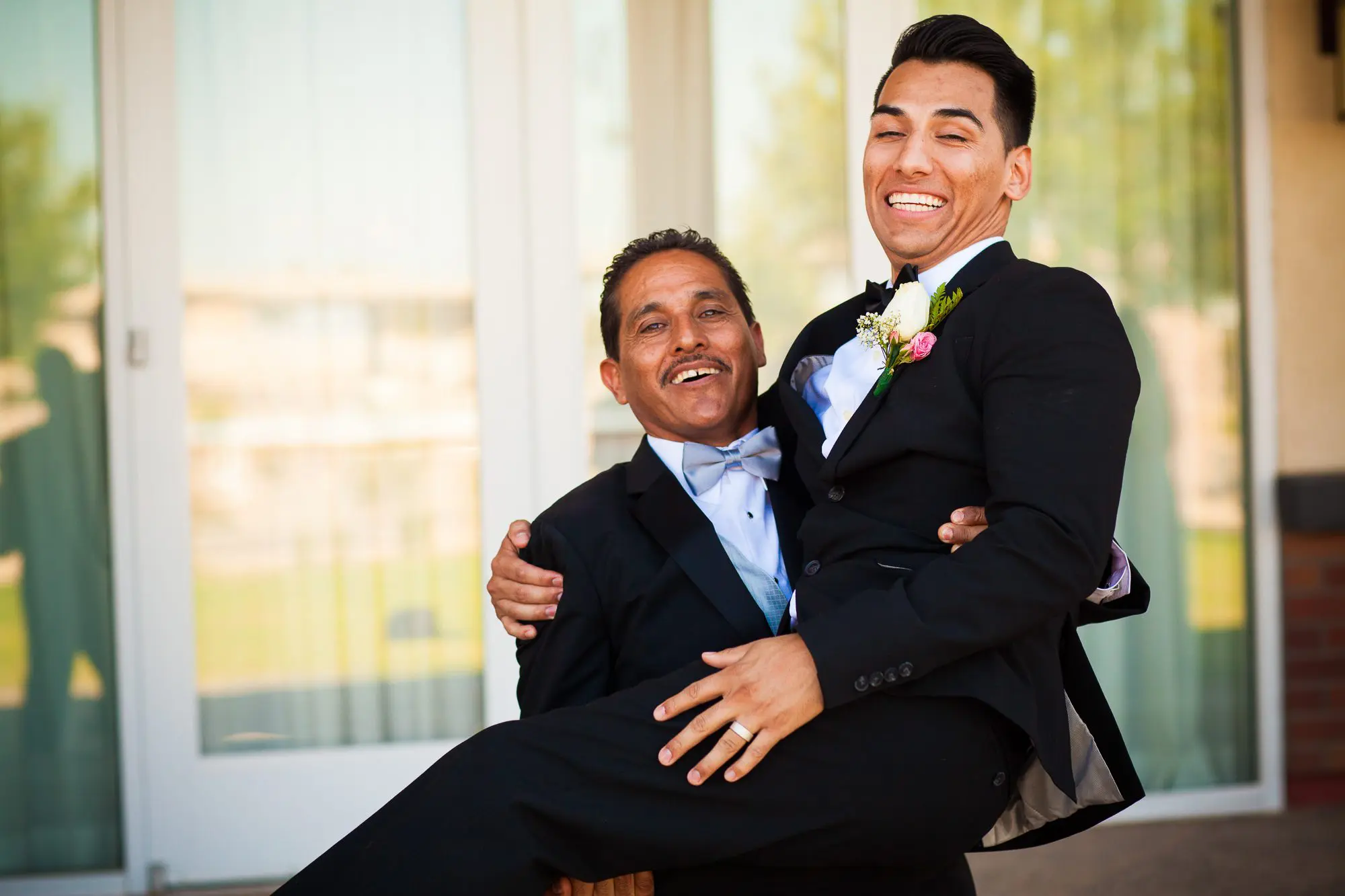 goofing around with the father of the groom
