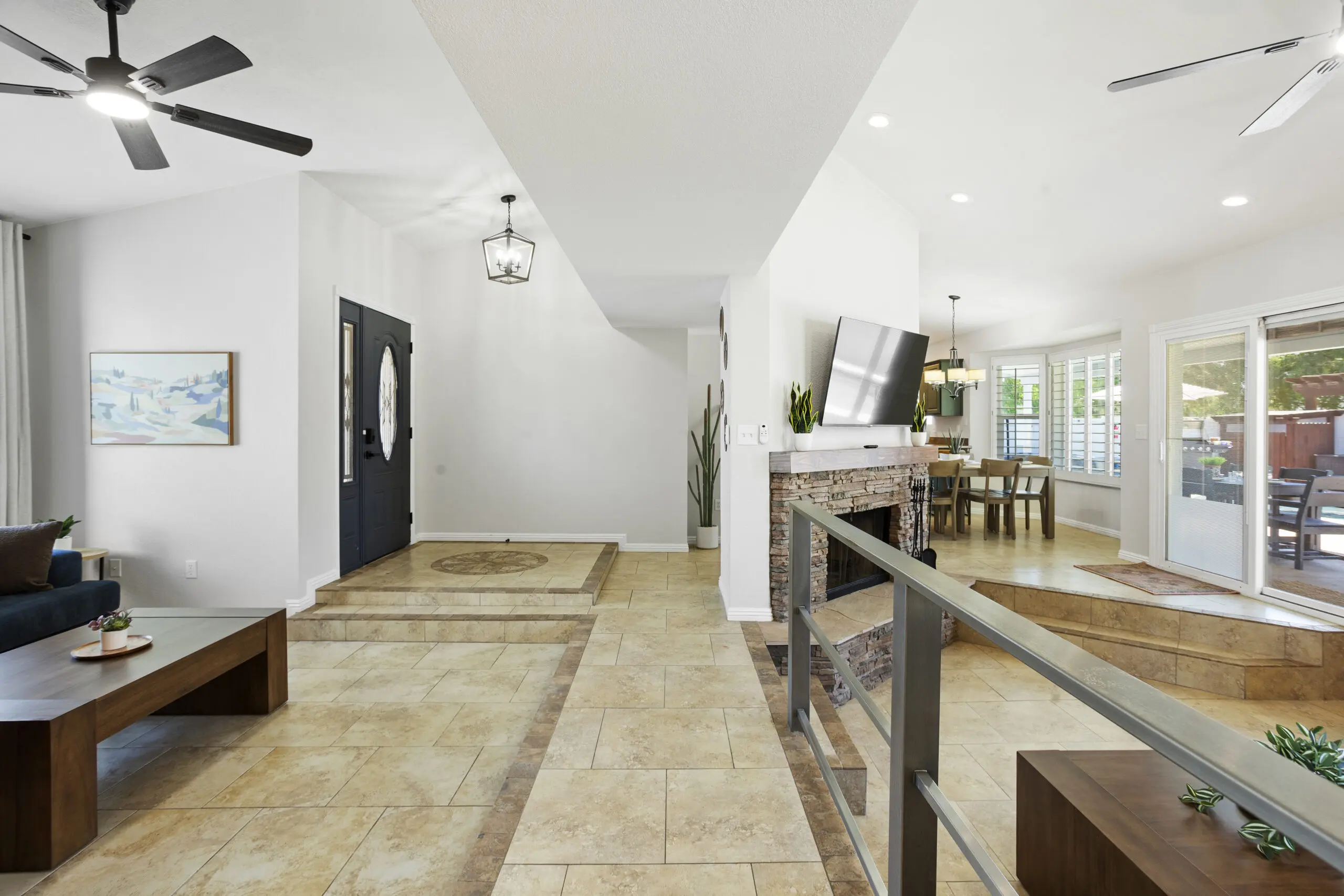 Outdoor patio dining and lounge area of the Gilbert AZ vacation rental at golden hour
