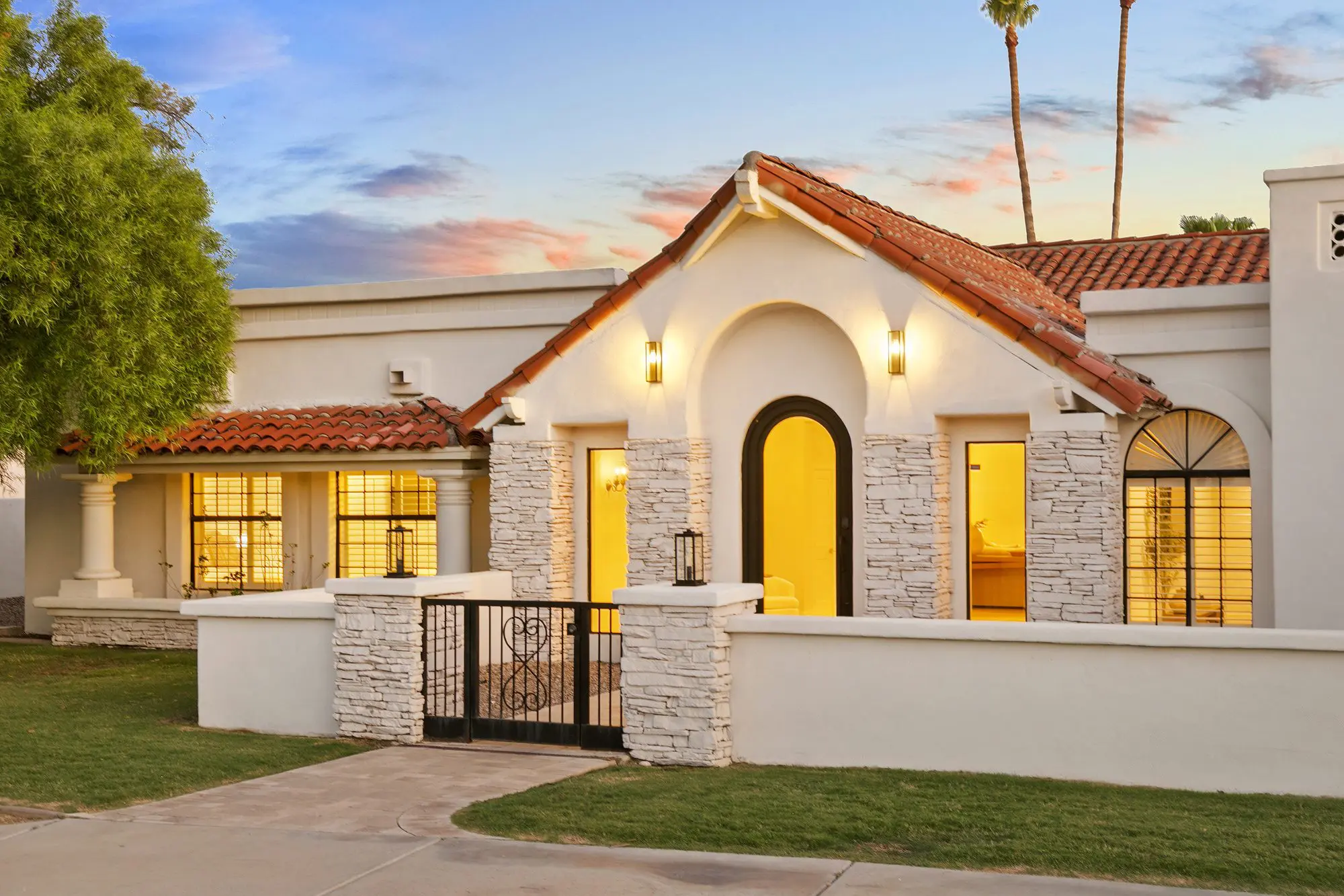 Scottsdale real estate photographer twilight front elevation, arched entry