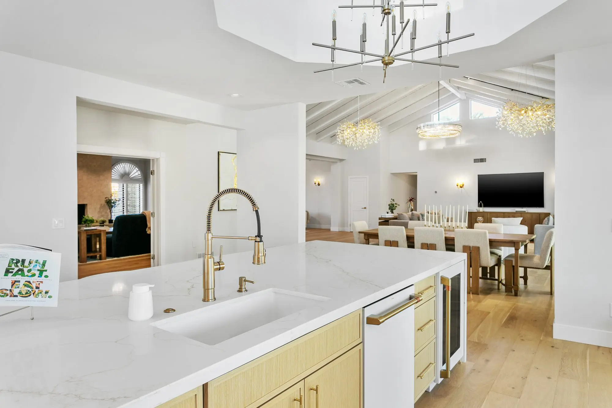 Kitchen detail, gold fixtures and marble counters