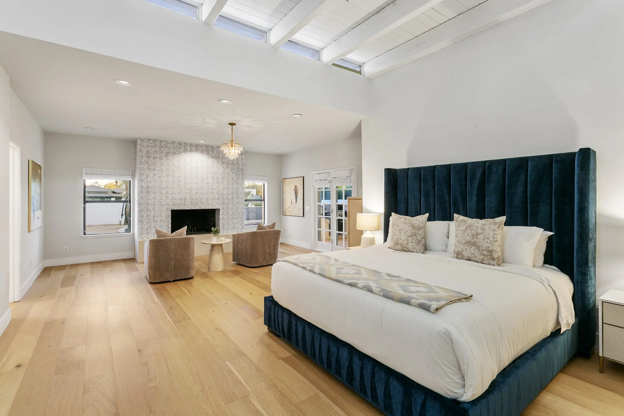 Primary bedroom with velvet headboard and fireplace, McDowell Ranchos