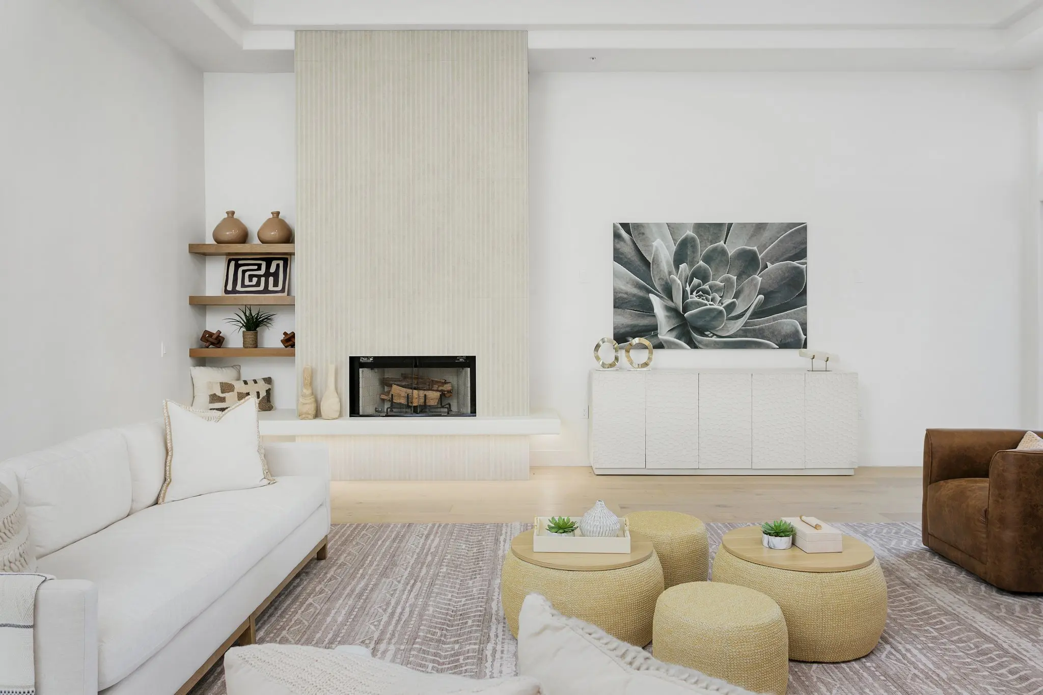 Family room with fireplace, white sofa and leather chairs, Scottsdale interior photography