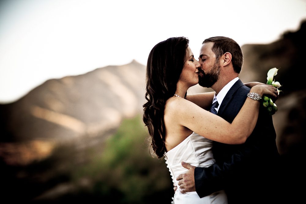 Kissing at South Mountain during formal photos