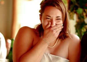 the bride laughing during speeches