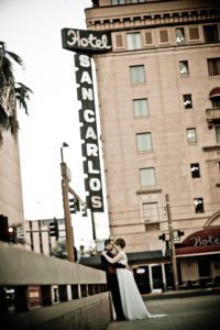 bride and groom outside the Hotel San Carlos in downtown Phoenix