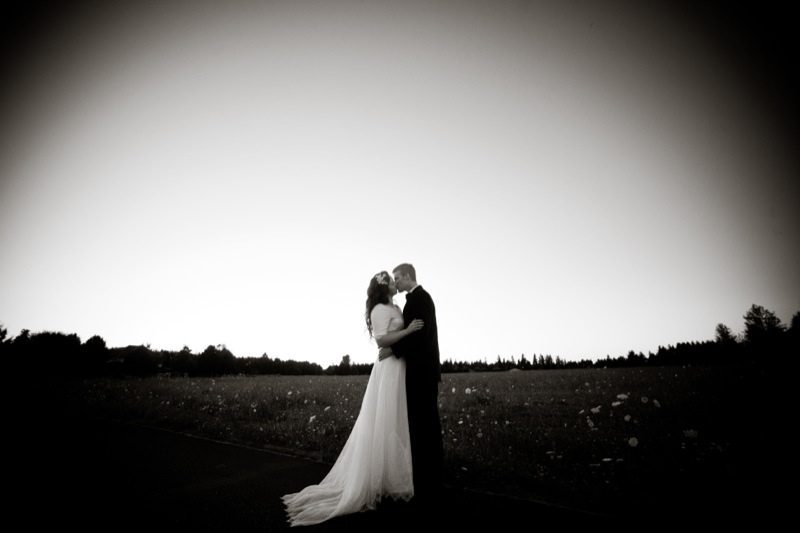 backyard wedding bride and groom in open field