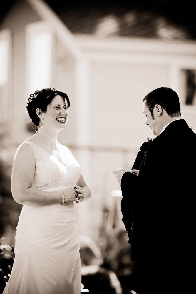 bride laughing at during the ceremony