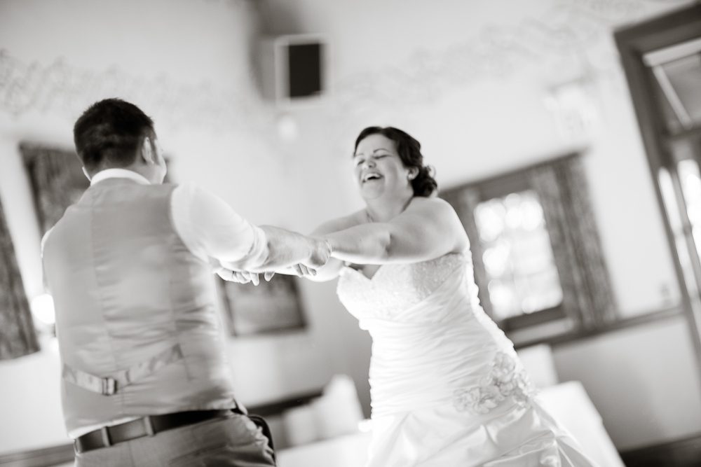 bride laughing during first dance