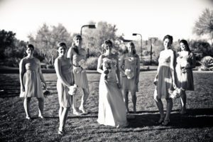 cool black and white photograph of the bride and bridesmaid