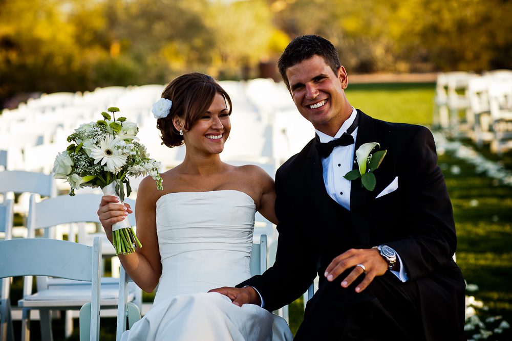 bride and groom smiling after wedding ceremony