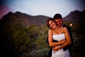 cute shot of bride and groom in the desert