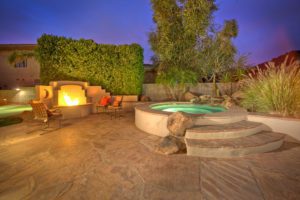 hot tub and firepit at night