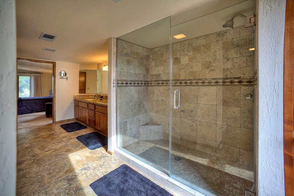 the shower in the master bathroom
