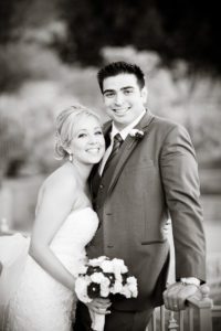 a black and white portrait of the bride and groom