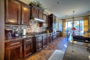 kitchen with wood cabinets and beautiful backsplash