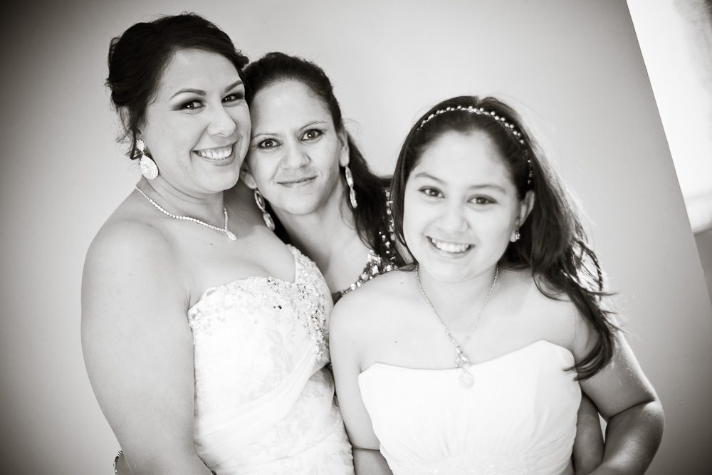the bride, mom, and flower girl