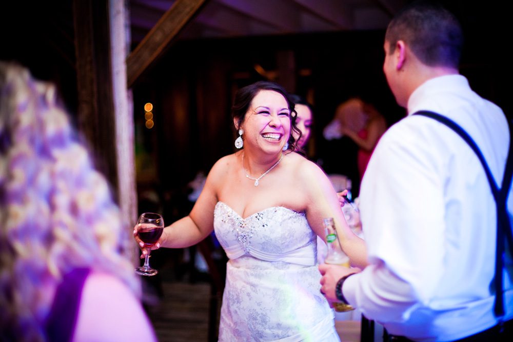 bride laughing during the reception